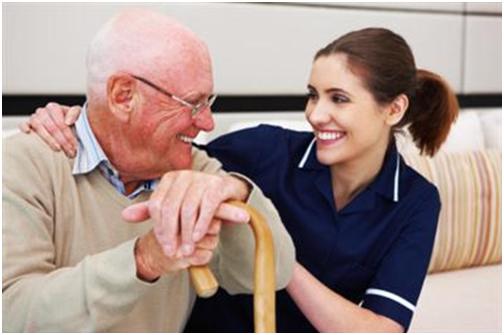 Caregiver and client outdoors on a bright morning